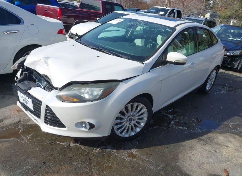 Photo 2 of 2012 Ford Focus TITANIUM (VIN 1FAHP3J24CL210299)