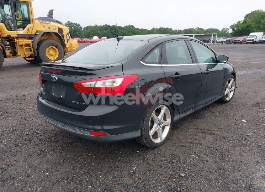 Photo 4 of 2012 Ford Focus TITANIUM (VIN 1FAHP3J29CL384353)
