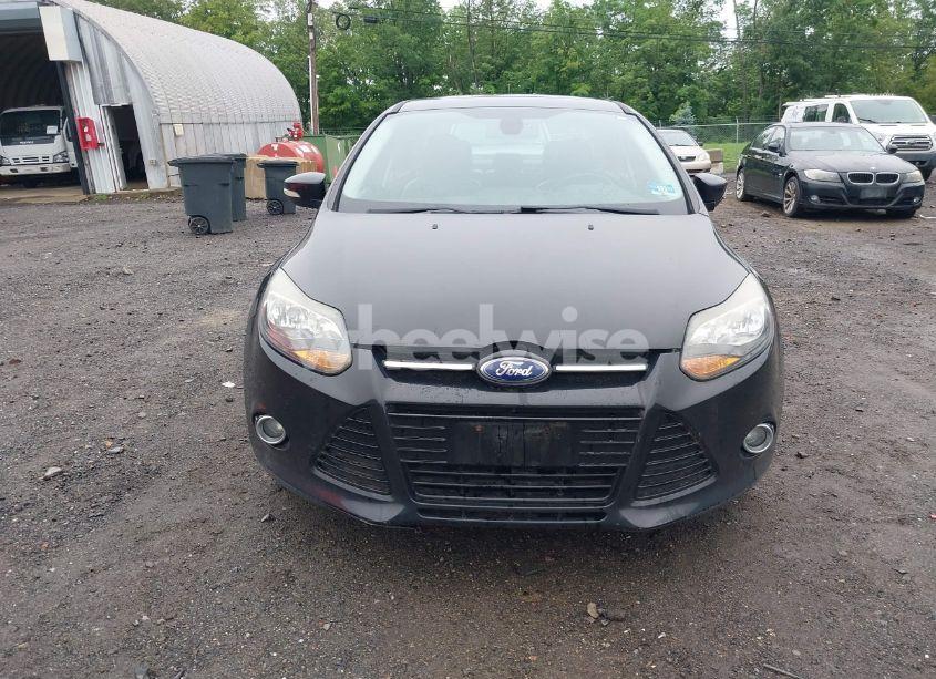 Photo 6 of 2012 Ford Focus TITANIUM (VIN 1FAHP3J29CL384353)