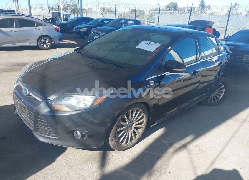 Photo 2 of 2012 Ford Focus TITANIUM (VIN 1FAHP3J29CL477390)