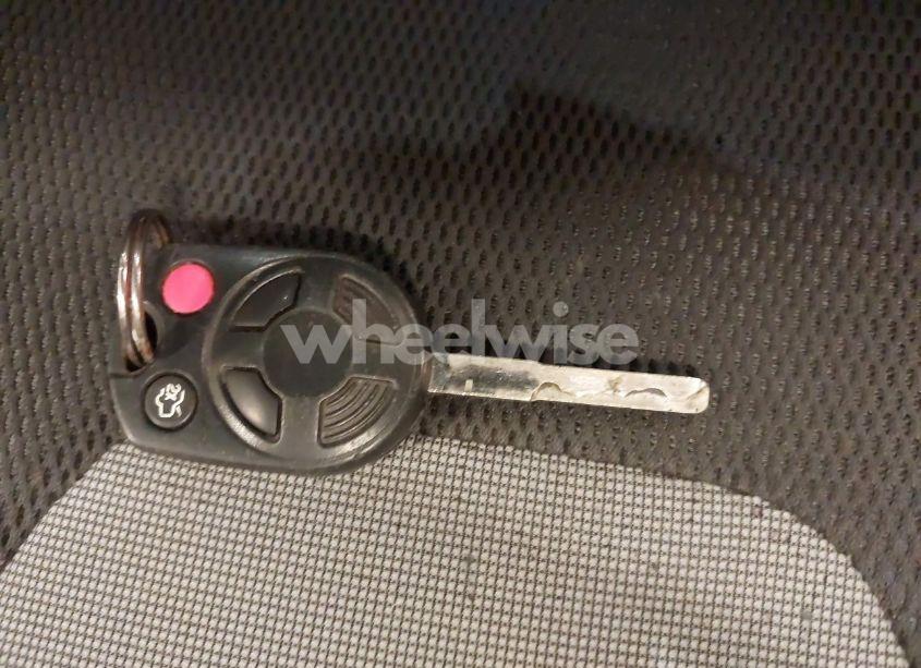 Photo 11 of 2012 Ford Focus SE (VIN 1FAHP3K20CL128861)