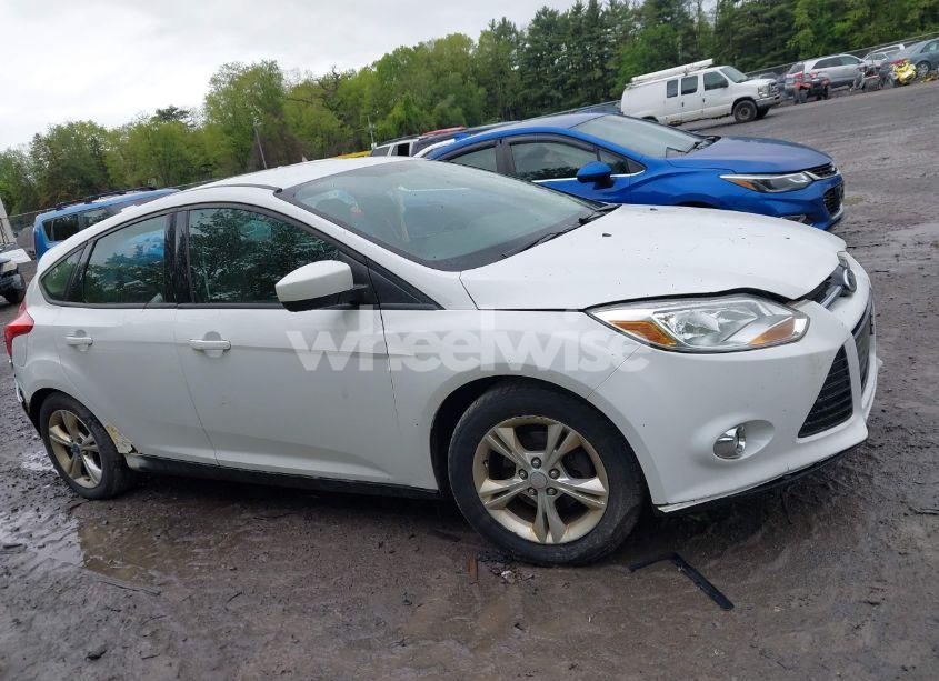 Photo 13 of 2012 Ford Focus SE (VIN 1FAHP3K20CL471993)