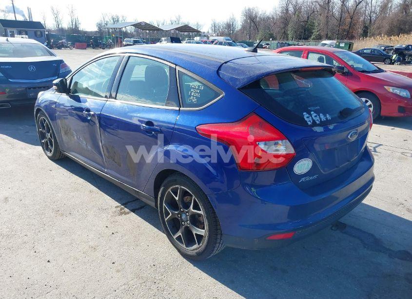 Photo 3 of 2012 Ford Focus SE (VIN 1FAHP3K21CL233571)