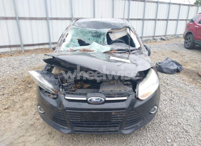 Photo 11 of 2012 Ford Focus SE (VIN 1FAHP3K21CL385219)