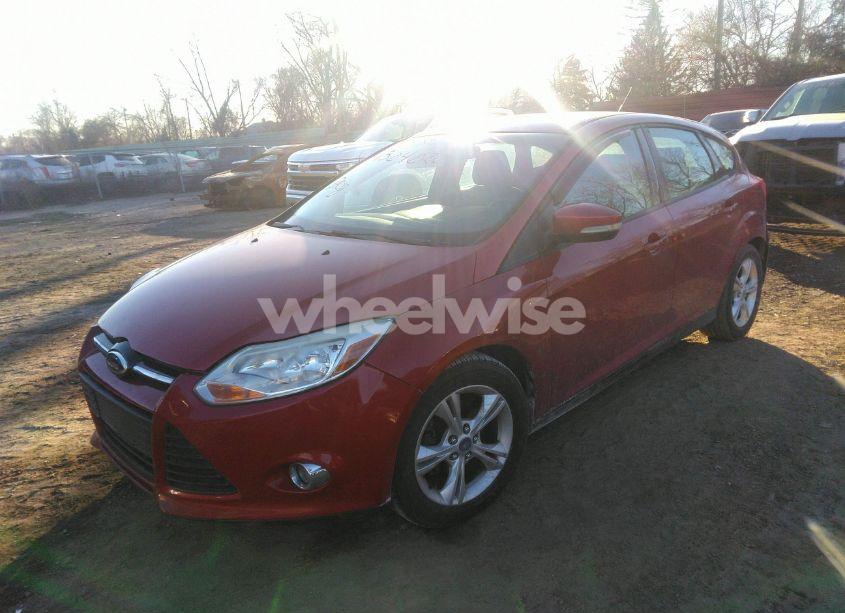 Photo 2 of 2012 Ford Focus SE (VIN 1FAHP3K21CL448884)
