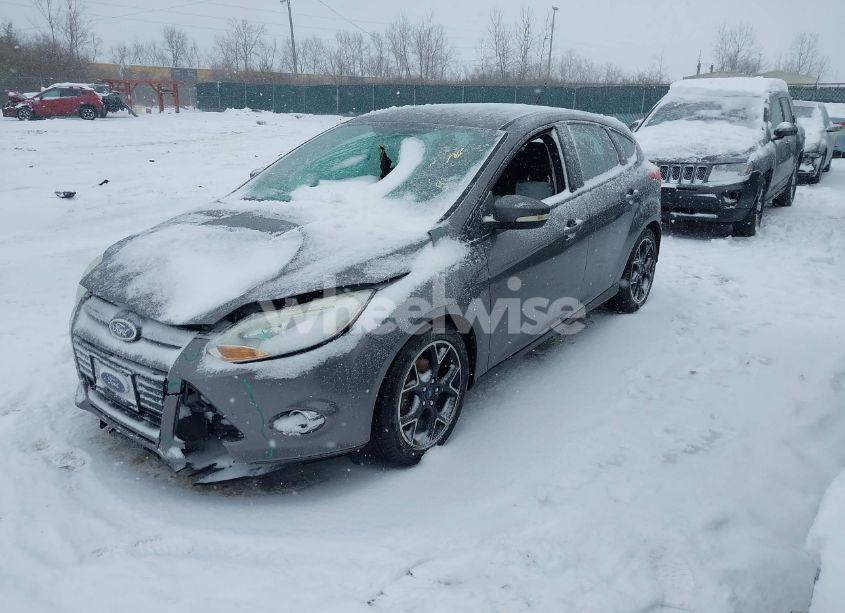 Photo 2 of 2012 Ford Focus SE (VIN 1FAHP3K27CL327230)