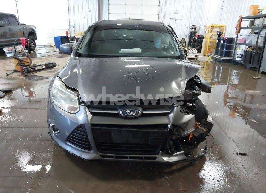 Photo 11 of 2012 Ford Focus SE (VIN 1FAHP3K2XCL139690)