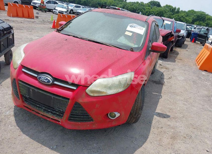 Photo 2 of 2012 Ford Focus SE (VIN 1FAHP3K2XCL454991)