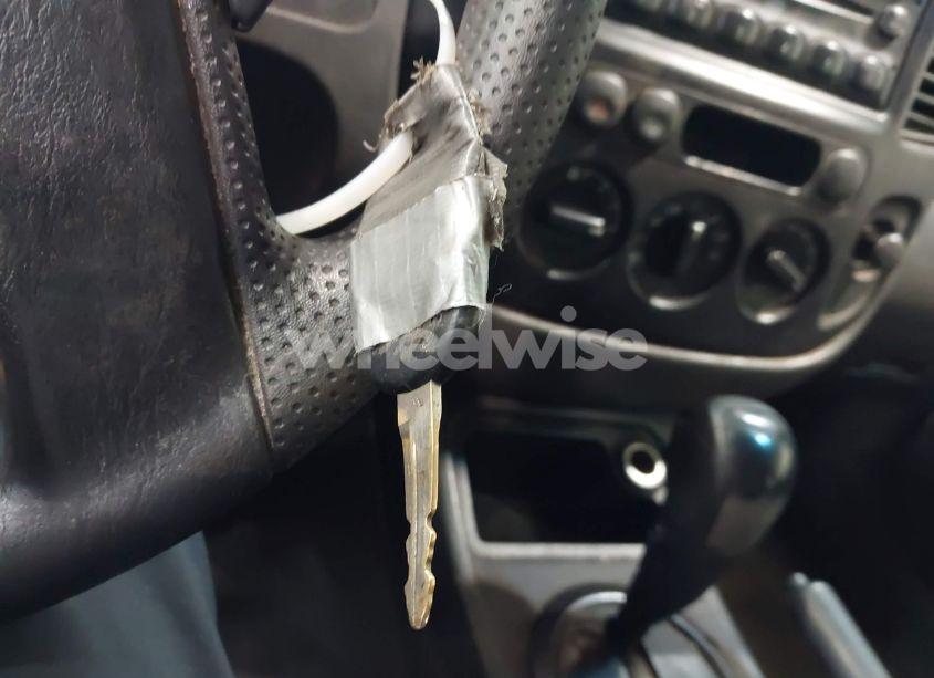 Photo 11 of 2005 Ford Escape XLS (VIN 1FMCU02Z95DA27139)