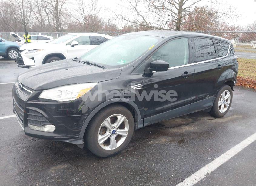 Photo 2 of 2016 Ford Escape SE (VIN 1FMCU0G71GUB10588)