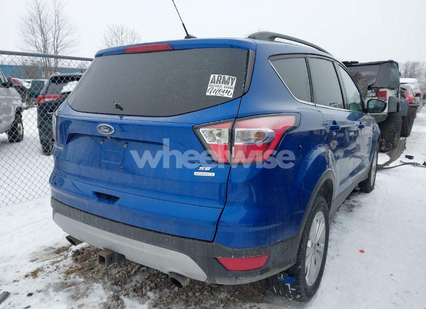 Photo 4 of 2017 Ford Escape SE (VIN 1FMCU0G97HUF10514)