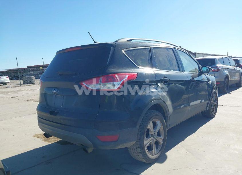 Photo 4 of 2016 Ford Escape SE (VIN 1FMCU0G99GUC19883)