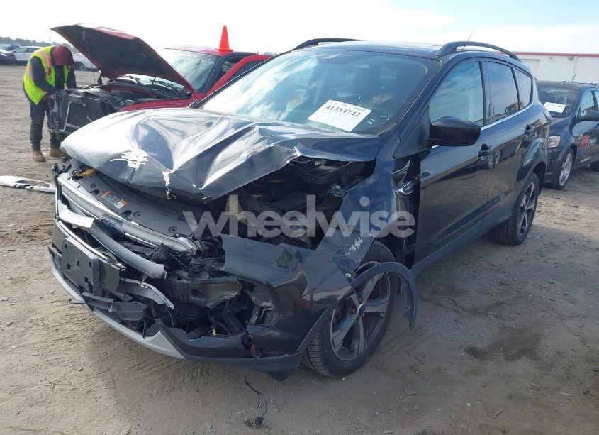 Photo 2 of 2017 Ford Escape SE (VIN 1FMCU0G99HUE13346)