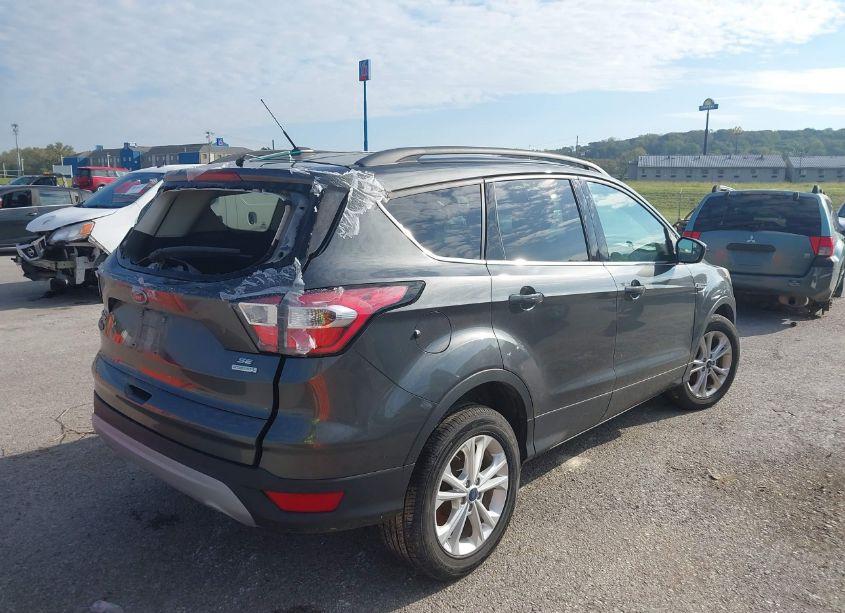 Photo 4 of 2018 Ford Escape SE (VIN 1FMCU0GD1JUB43037)