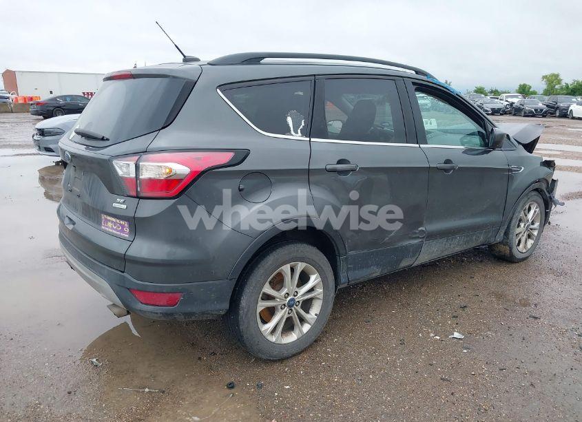 Photo 4 of 2018 Ford Escape SE (VIN 1FMCU0GD3JUA12515)
