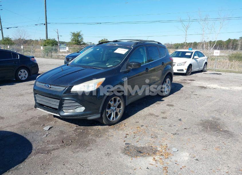 Photo 2 of 2013 Ford Escape SE (VIN 1FMCU0GX2DUC19606)