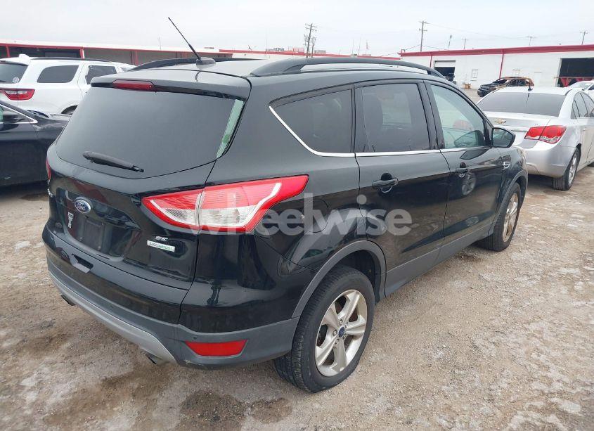 Photo 4 of 2016 Ford Escape SE (VIN 1FMCU0GX5GUA07965)