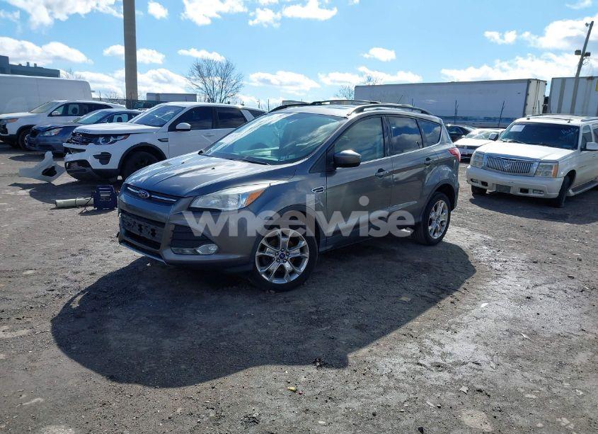 Photo 2 of 2013 Ford Escape SE (VIN 1FMCU0GX9DUA38440)