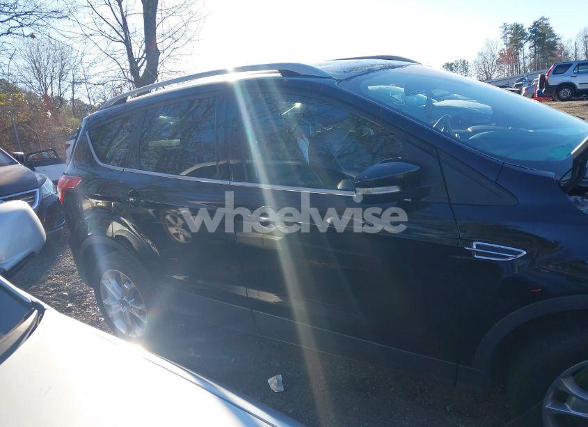 Photo 13 of 2016 Ford Escape TITANIUM (VIN 1FMCU0J90GUC62887)