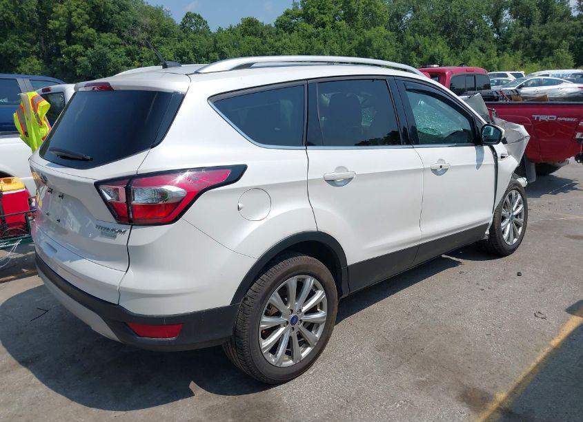 Photo 4 of 2017 Ford Escape TITANIUM (VIN 1FMCU0J91HUB60516)