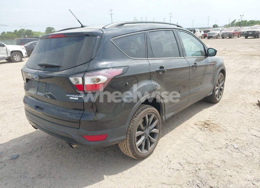 Photo 4 of 2017 Ford Escape TITANIUM (VIN 1FMCU0J91HUC13795)