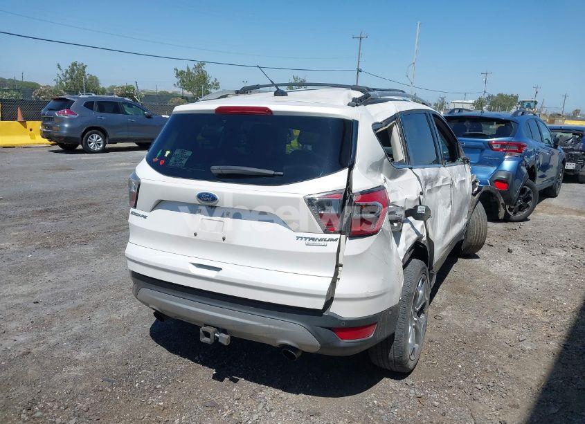 Photo 4 of 2017 Ford Escape TITANIUM (VIN 1FMCU0J96HUA62002)