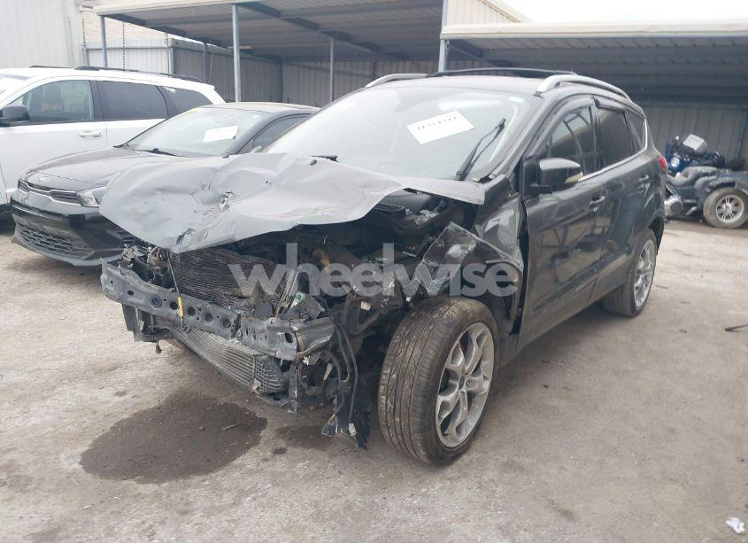 Photo 2 of 2016 Ford Escape TITANIUM (VIN 1FMCU0J97GUA09291)