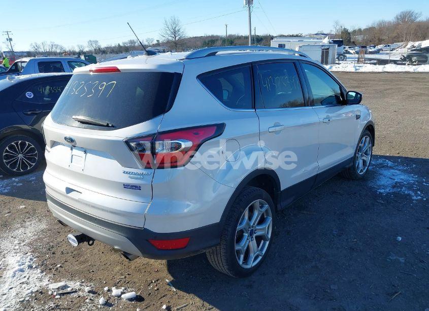 Photo 4 of 2017 Ford Escape TITANIUM (VIN 1FMCU0J97HUA93064)