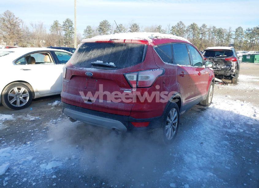 Photo 4 of 2017 Ford Escape TITANIUM (VIN 1FMCU0J98HUC98957)