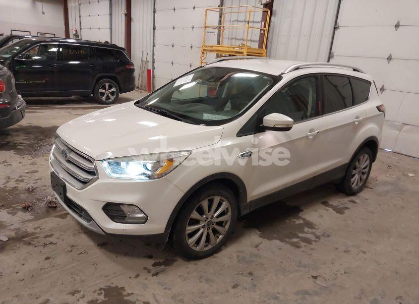Photo 2 of 2017 Ford Escape TITANIUM (VIN 1FMCU0J98HUE07904)