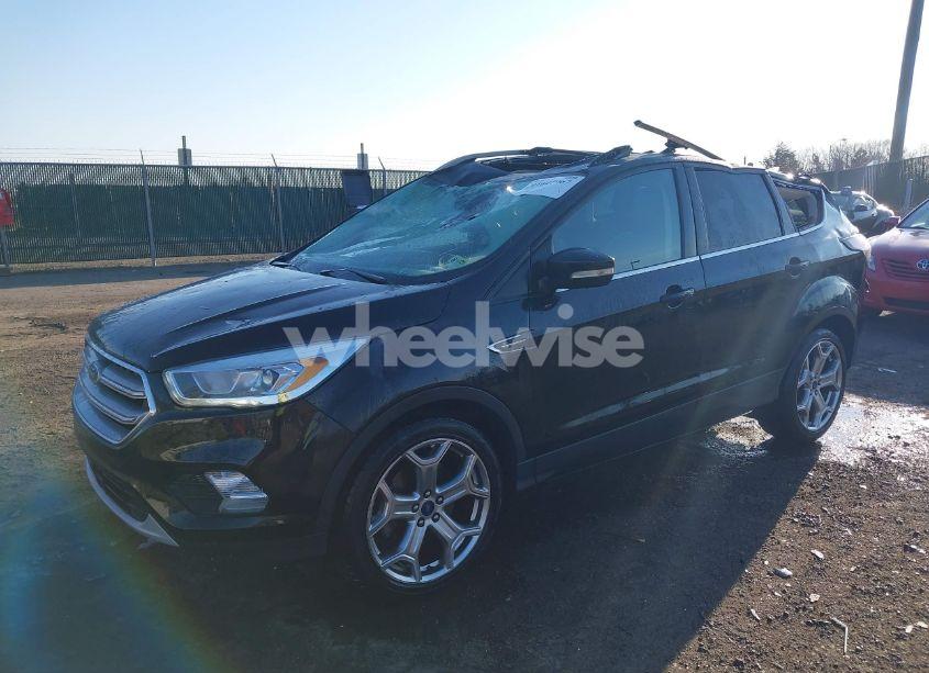 Photo 2 of 2017 Ford Escape TITANIUM (VIN 1FMCU0J99HUA09827)