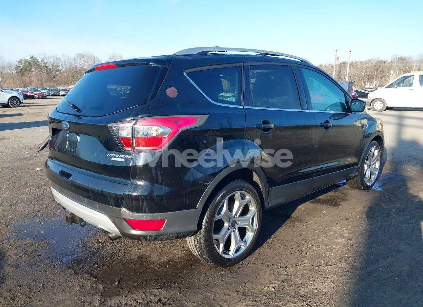 Photo 4 of 2017 Ford Escape TITANIUM (VIN 1FMCU0J99HUA09827)