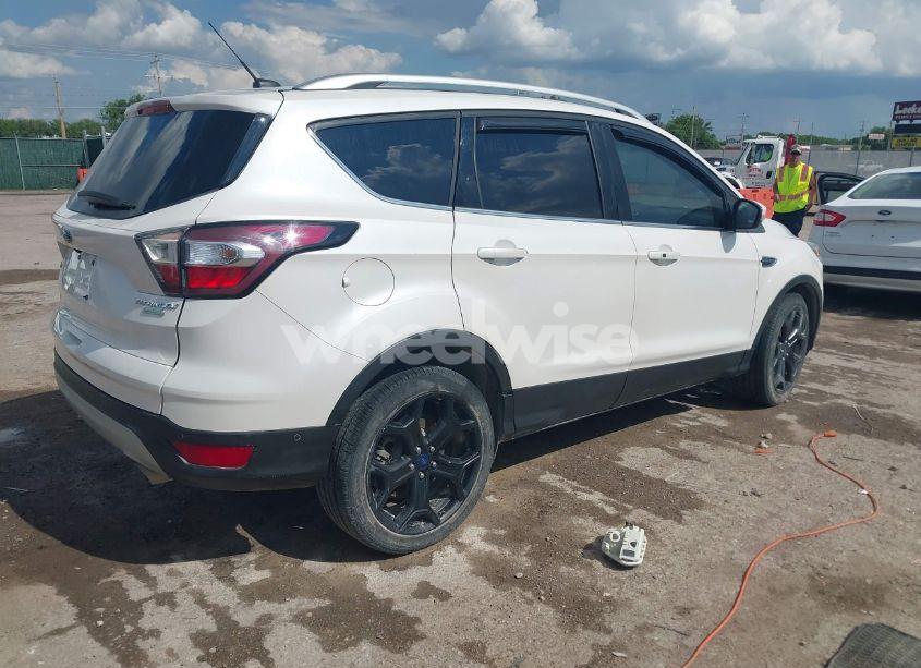 Photo 4 of 2017 Ford Escape TITANIUM (VIN 1FMCU0J99HUB01830)