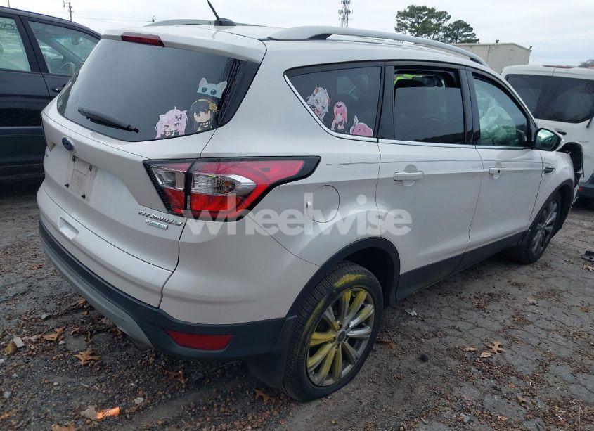 Photo 4 of 2017 Ford Escape TITANIUM (VIN 1FMCU0J9XHUF09642)