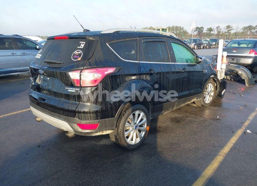 Photo 4 of 2017 Ford Escape TITANIUM (VIN 1FMCU0JD1HUD15439)