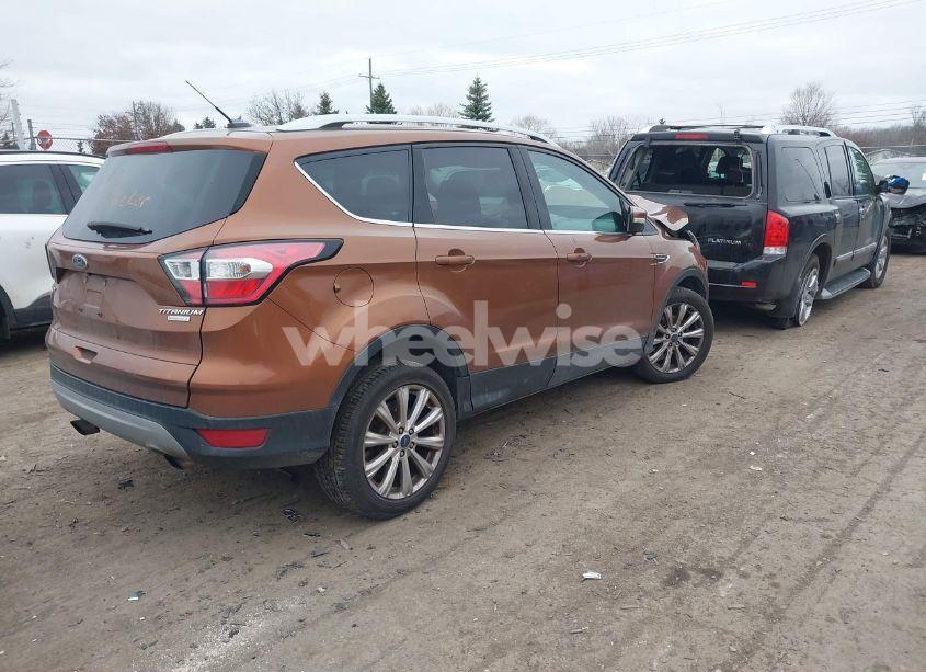 Photo 4 of 2017 Ford Escape TITANIUM (VIN 1FMCU0JD2HUD51981)