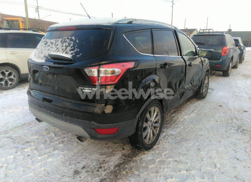 Photo 4 of 2017 Ford Escape TITANIUM (VIN 1FMCU0JD8HUE33634)