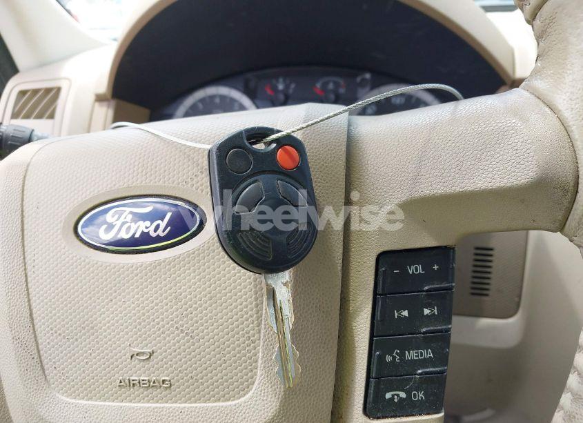 Photo 11 of 2011 Ford Escape XLT (VIN 1FMCU9D77BKA45274)