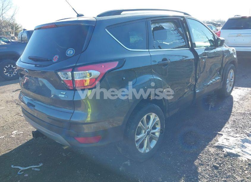 Photo 4 of 2017 Ford Escape SE (VIN 1FMCU9G91HUE52887)