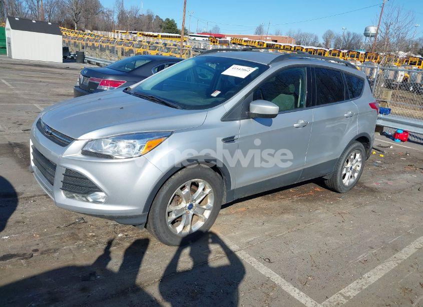 Photo 2 of 2013 Ford Escape SE (VIN 1FMCU9G94DUA37704)