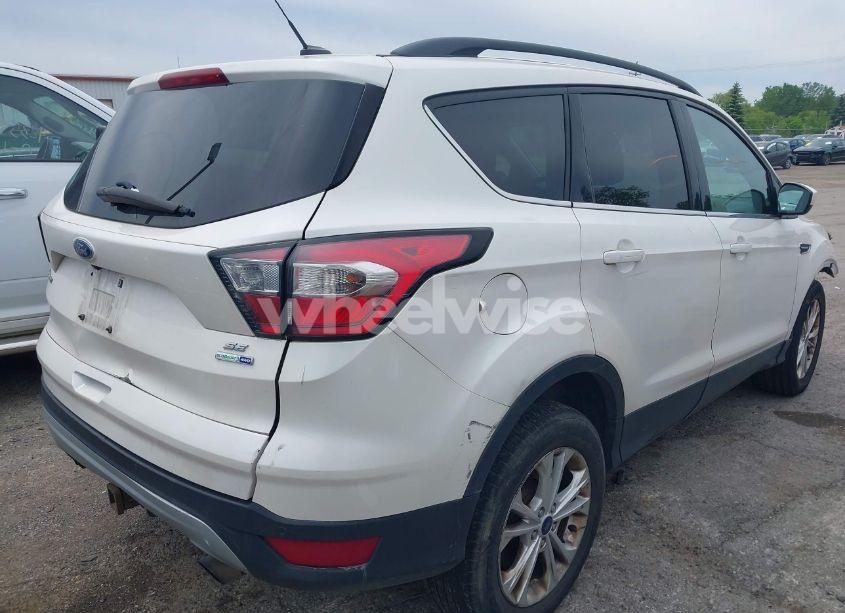 Photo 4 of 2017 Ford Escape SE (VIN 1FMCU9G99HUE31303)