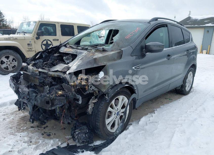 Photo 2 of 2017 Ford Escape SE (VIN 1FMCU9GD0HUE93029)