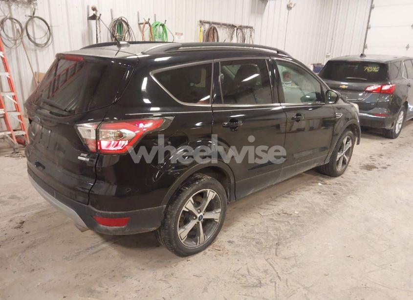Photo 4 of 2017 Ford Escape SE (VIN 1FMCU9GD1HUA38304)