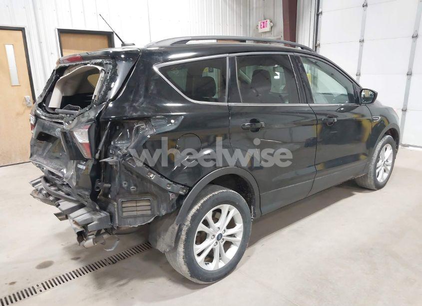 Photo 4 of 2018 Ford Escape SE (VIN 1FMCU9GD1JUD21727)