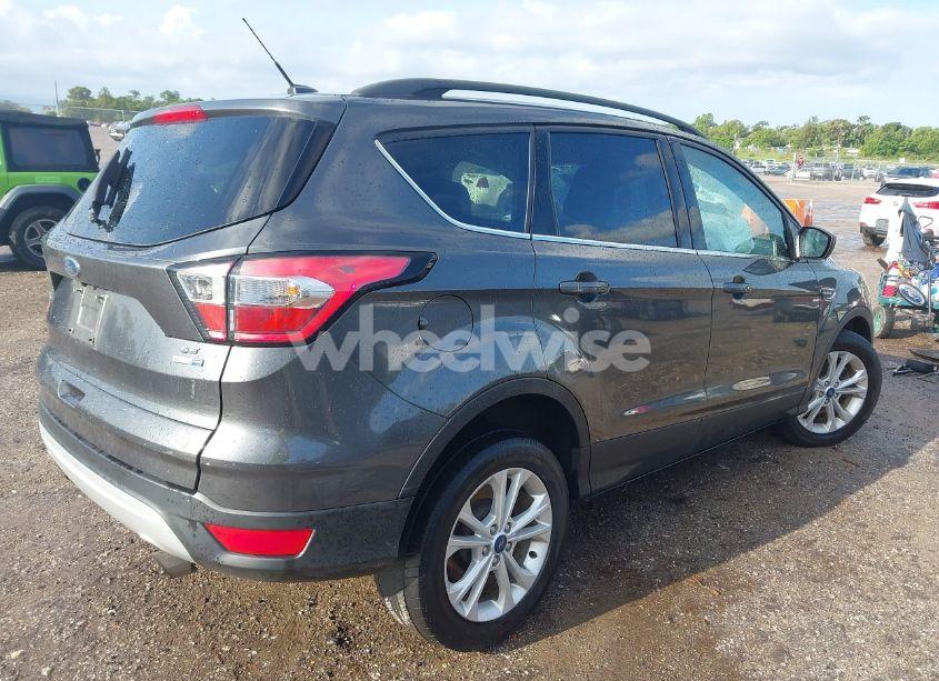 Photo 4 of 2018 Ford Escape SE (VIN 1FMCU9GD2JUD56311)