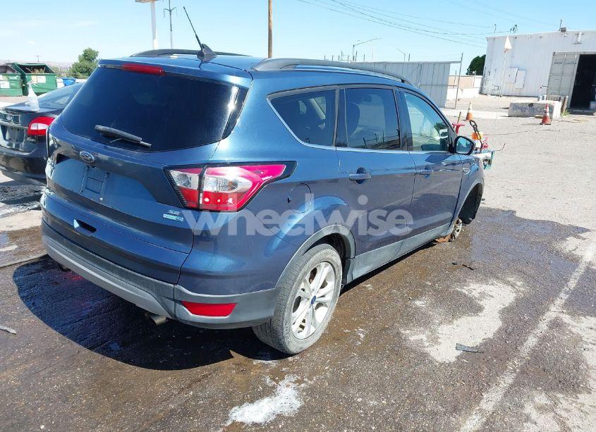 Photo 4 of 2018 Ford Escape SE (VIN 1FMCU9GD3JUC75110)