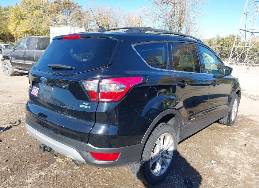 Photo 4 of 2018 Ford Escape SE (VIN 1FMCU9GD3JUD57726)