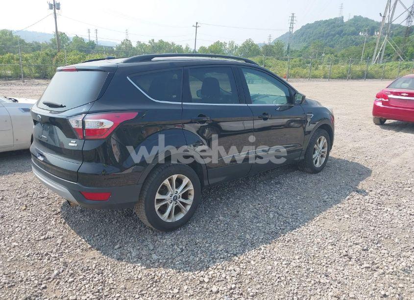 Photo 4 of 2017 Ford Escape SE (VIN 1FMCU9GD5HUE00537)
