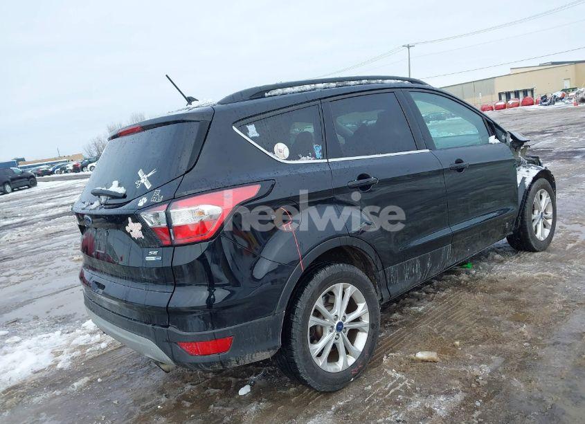 Photo 4 of 2018 Ford Escape SE (VIN 1FMCU9GD5JUA61882)