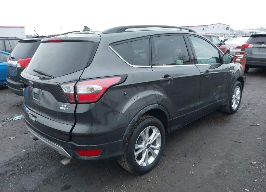 Photo 4 of 2018 Ford Escape SE (VIN 1FMCU9GD6JUA53385)